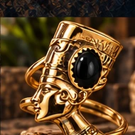 Gold Nefertiti profile ring featuring a black oval stone